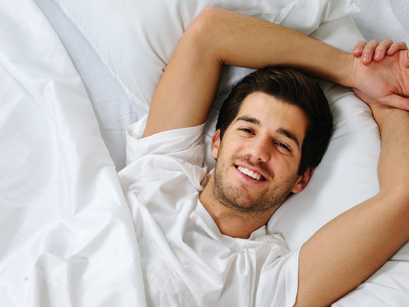 Orthodontist examining a young boy's teeth
