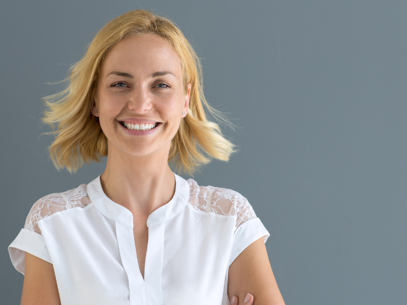 teens sitting down laughing